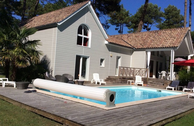 VILLA 4 *, quiet, on golf course, heated pool, beaches, lake, ocean,
