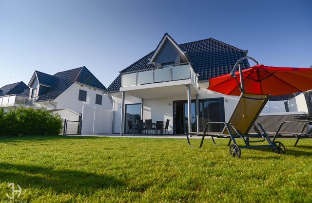 Villa Fleesenstrand am See | with outdoor whirlpool | Sky TV | Fireplace | sauna