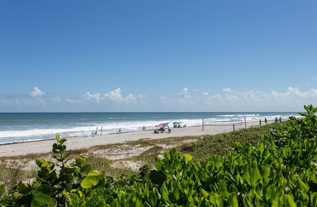 WALK TO BEACH AND HEATED POOL! Beachside Paradise One Block from Ocean!