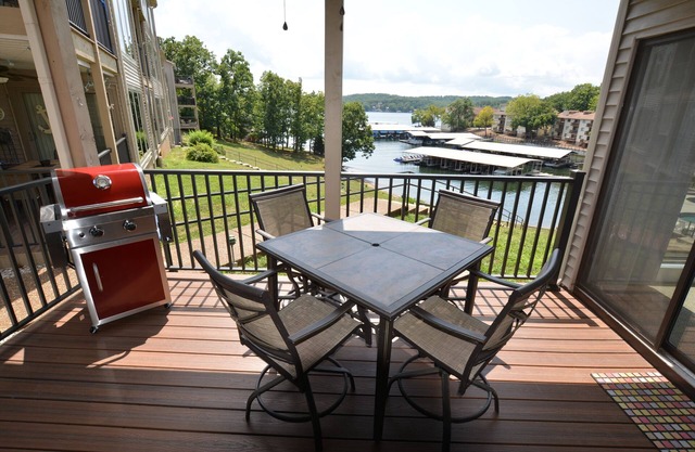 Waterfront Condo with Walk-Out to Pool & Lake! Beautiful Inside! Electric Grill!