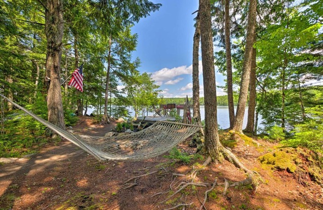 Waterfront Great Pond Cottage with Hot Tub and Deck!