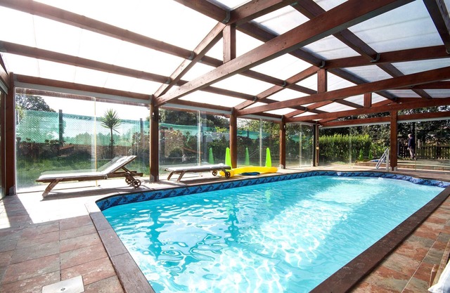 With pool and private estate