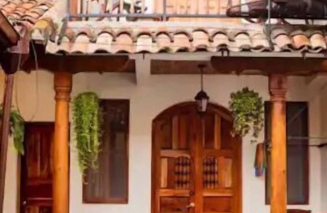 You’ll know that you have rented a historic colonial home when you pass through huge, antique front doors framed by 3 foot-thick adobe walls. Lounge on the shallow, submerged bench seats in the pool or in the hammocks hanging between 12 foot wooden c