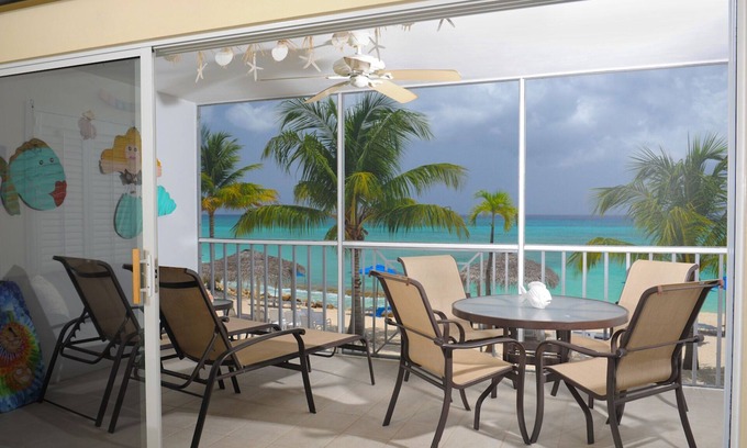 Seven Mile Beach Condo | #14 Oceanfront Discovery Point Club -Fall Spec. Stay 6 & Get the 7th Night FREE!