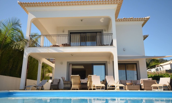 Estreito da Calheta Villa | 17 ° West, Lux. Inf. Pool villa, 5 minutes to the sandy beach, WiFi