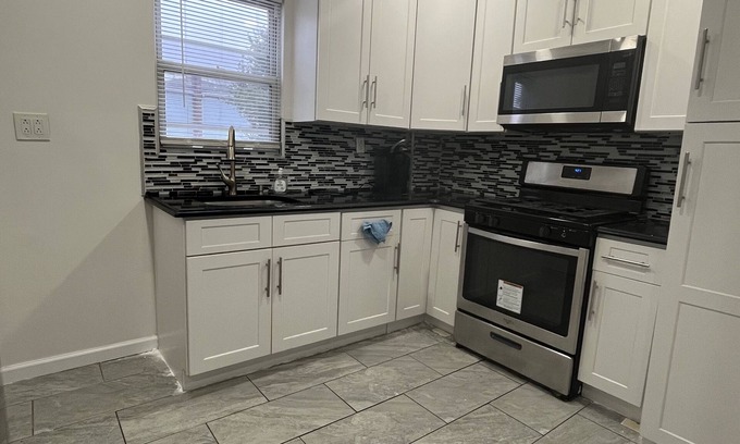 Elmont Apartment | 2 bed room apartment w/parking.