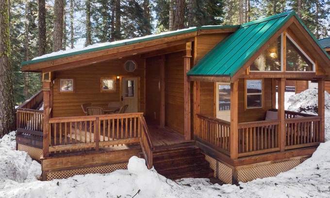 Historic Railroad District Cabin | 2 bedroom cabin, huge deck, lodge-style furnishings.