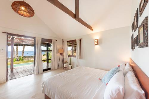 Catangnan Villa | 3BR Beachfront Villa, Pool, Garden, Surf Spot