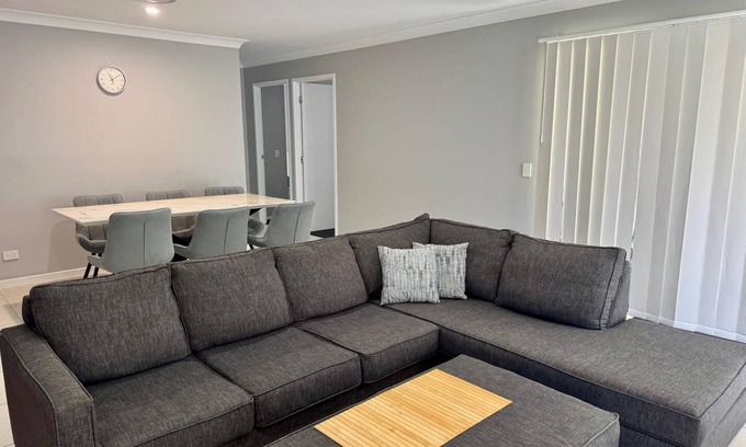 Coomera House | 4-BR Home close to beaches and attractions. Includes access to a pool, spa, gym