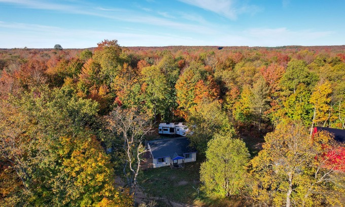 Coldsprings Township Cabin | 400-Acre Outdoor Enthusiast's Lodge in Mancelona!