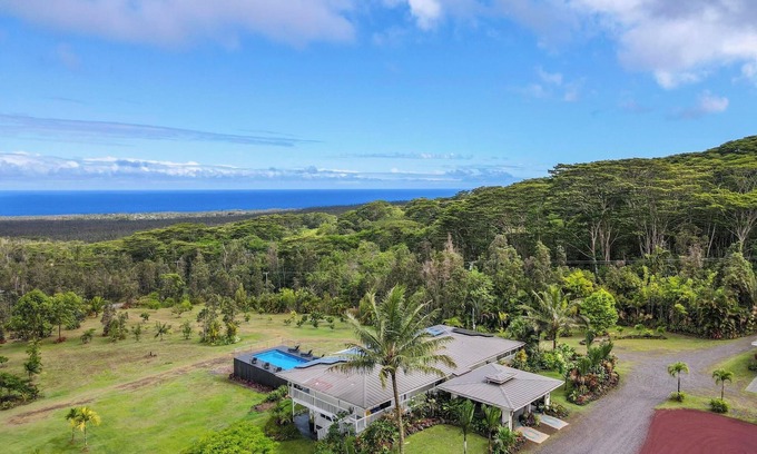 Pahoa Villa | 5-Acre Gated Retreat – Heated Pool & Spa, Horses, Orchard & Sweeping Ocean Views