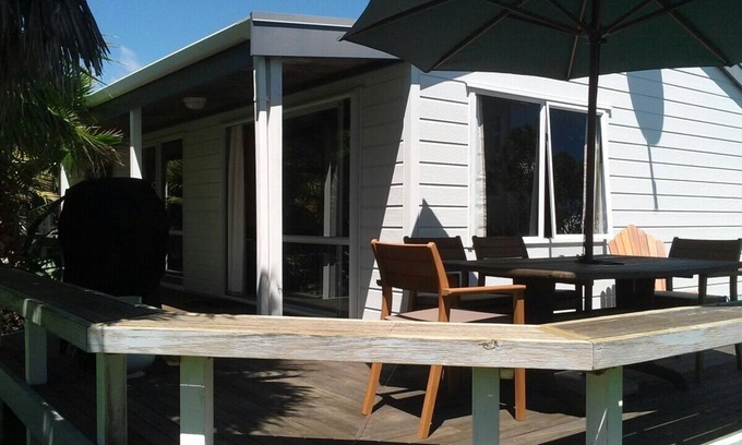 Matarangi House | 5 minutes walk to beautiful beach & shops, fully fenced section pet friendly.
