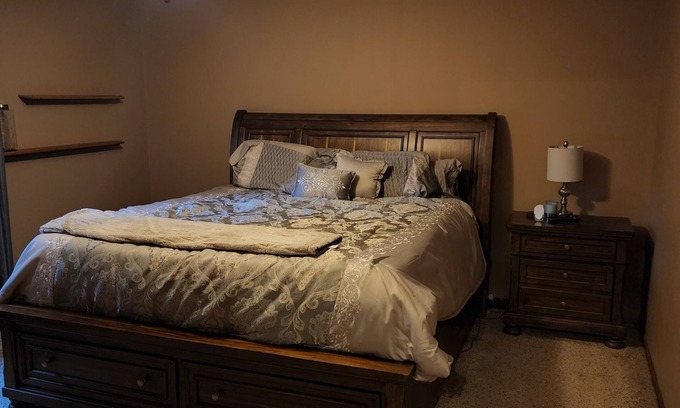 Holt House | 5-Star 3 bedroom home with heated pool and hot tub! 10 minutes away from MSU