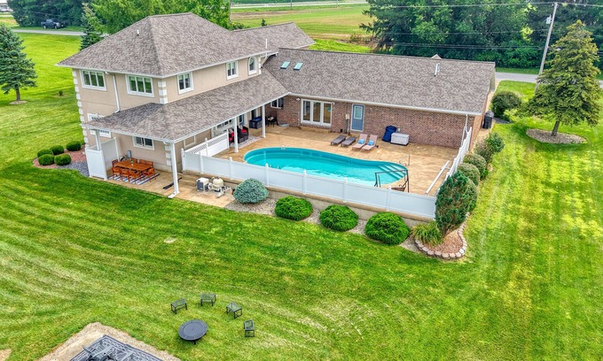 Bellevue House | 5000+ Sq Ft retreat w/pool, tanning bed, and gym near Cedar Point and Lake Erie