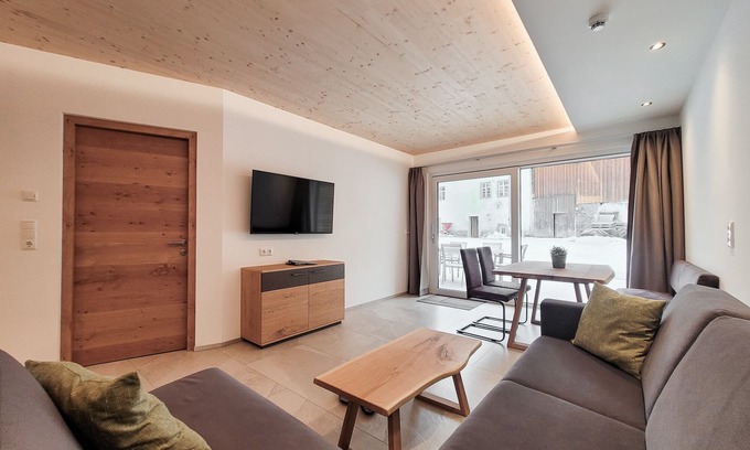 Bichlbach Apartment | 50m² modern vacation apartment with terrace, free bathing lake, 100m to the ski area