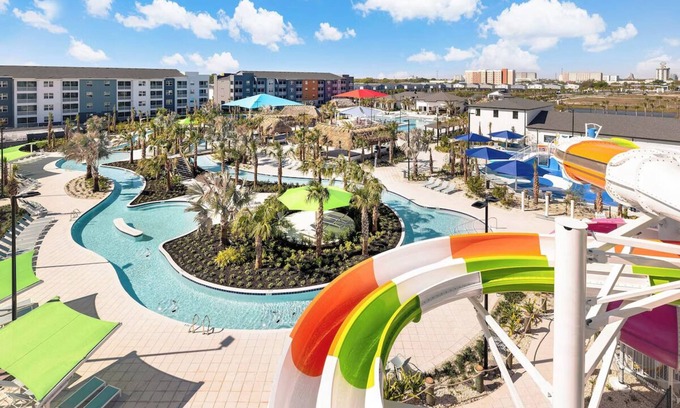 Florida Center Hotel | 9 Bedroom Home at Villatel Orlando Resort - Water Slides & Kids’ Playroom