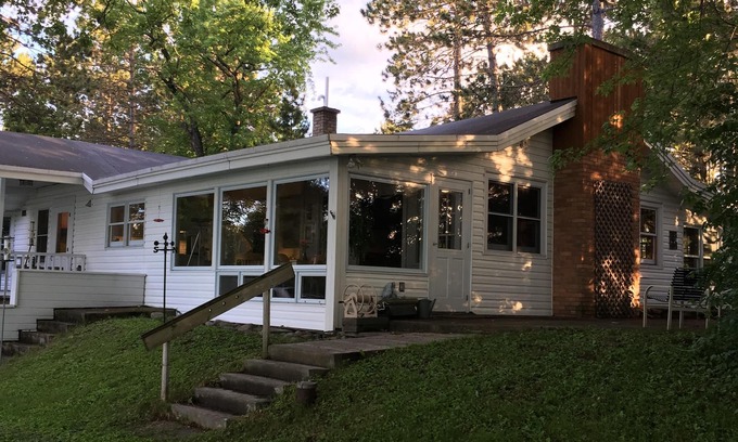 Eveleth House | A charming home on a beautiful peninsula on a crystal clear lake.