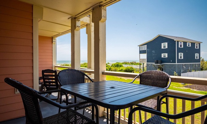 Caswell Beach Condo | A Pelican's Paradise: Condo with Community Pool and Ocean Views