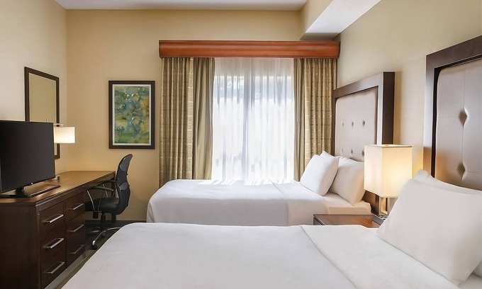 Feather Sound Hotel | A Place You'll Surely Enjoy! Full Kitchen, Free Breakfast, Outdoor Pool!