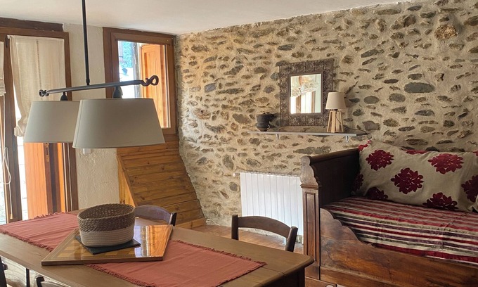 Osseja Apartment | A stone cocoon just 10 minutes from the hot springs and hiking trails.