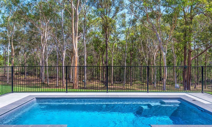 Dakabin House | A tranquil bushland retreat with KB, Ducted AC and access to a heated pool.