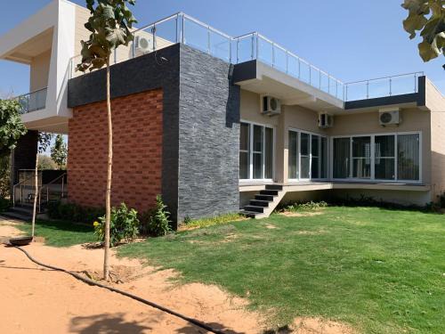 Uchiyarda House | Abhikram Homes
