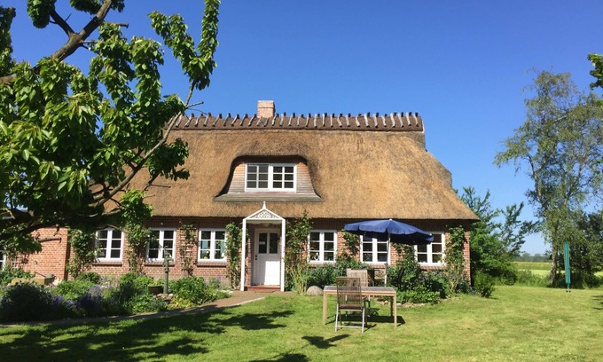 Gelting House | Absolute peace: Detached thatched house with huge garden, pool, sauna .
