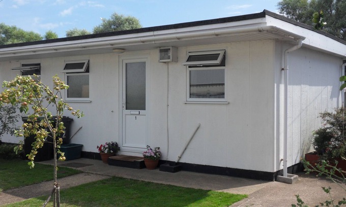 West Bay House | Accommodation for a couple, just a short walk from the beaches and harbour.