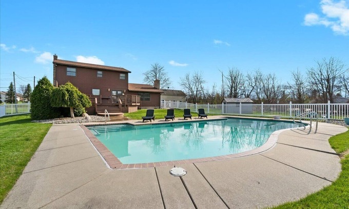 Grand Blanc House | Acorn House - 3 bedroom home with an inground pool, hot tub and a gas fireplace!
