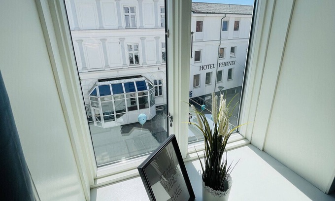 Hjørring Apartment | aday - Blue light suite apartment in the center of Hjørring