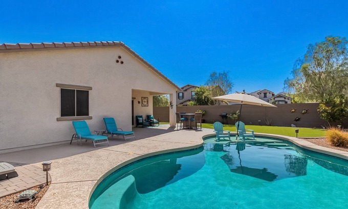 Buckeye House | Airy desert home with an enclosed yard, private pool, hot tub, firepit, & W/D