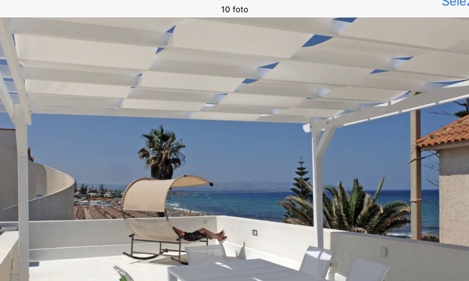 Reitani House | Almaga to experience the crystalline sea of Sicily as if you were at home.