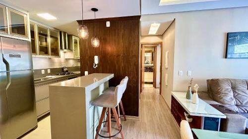 Carniel Apartment | Alto Padrão com lareira, piscina e vista incrível