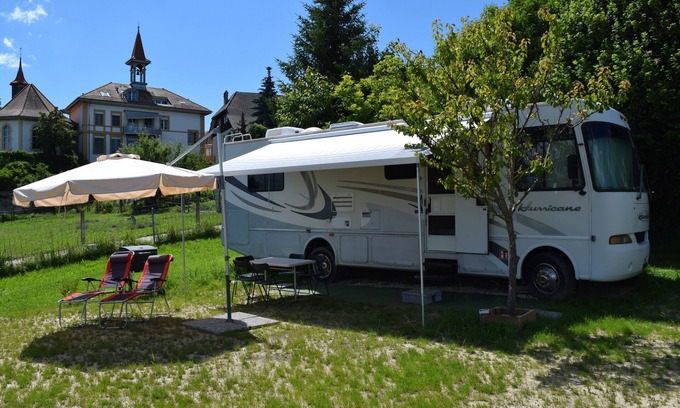 Villars-le-Grand House | American Ford Hurricane motorhome, with slide.