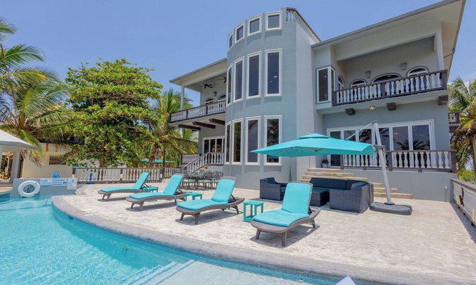 San Pedro Villa | An unBELIZEable home.Barefoot beachfront luxury!