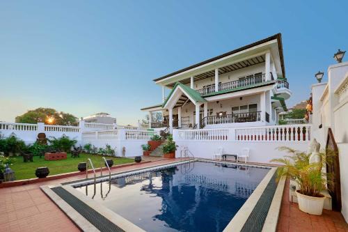 Lonavala Villa | Ananda Villa by StayVista - A serene escape with Mountain-view, Heritage interiors, Swimming pool & Lush lawn