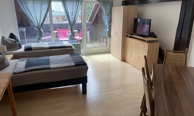 Fuldabruck Apartment | Apartment-Budget-Private Bathroom-Courtyard view