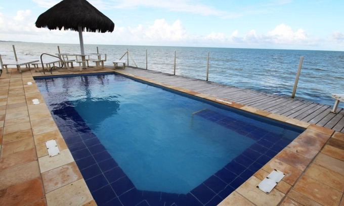 Maria Farinha Apartment | Apartment 02 side/sea view, ground floor, 1 suite and 1 bedroom. Solar Maradentro