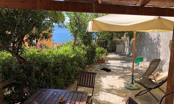 Pomonte Apartment | Apartment with exclusive garden and seaview in Pomonte, 50 meters from the sea
