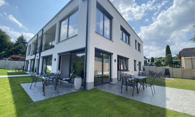 Saaldorf Condo | Apartments-Saaldorf WG1 with terrace and view of the reservoir