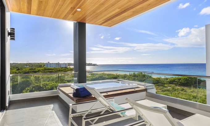West End Village Villa | Award-winning Tranquility Beach Resort Oceanview Penthouse Villa on Meads Bay