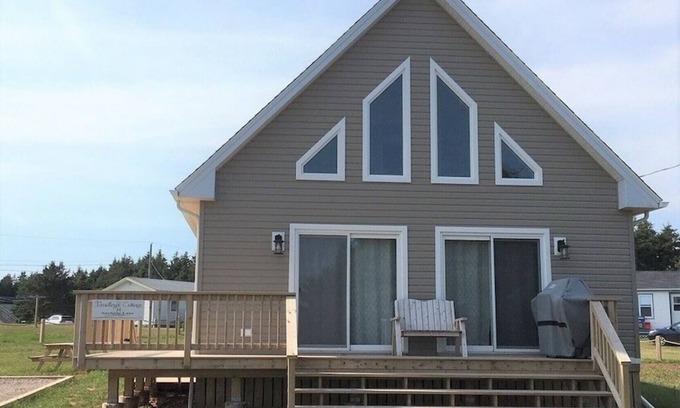 Savage Harbour Cottage | Beach House across from Savage Harbour Beach with Spectacular Ocean View!