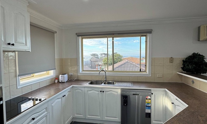 San Remo House | Beach house with water view. Walking distance to amenities . Walk to the beach.