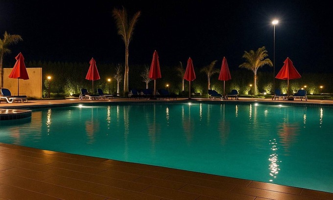 Al-Manasrah Ski Chalet | Beachfront Chalet in Porto Said with P Garden