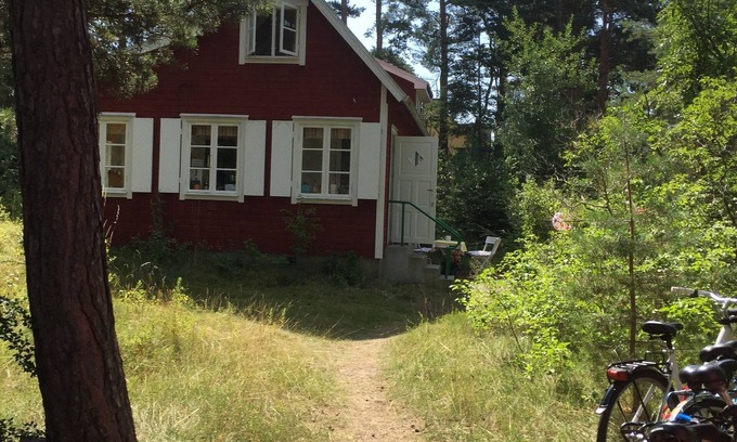 Aahus House | Beachfront classic summer cottage for the family in Ahus. Ideal for families with children