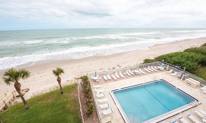 Indian Harbour Beach Condo | Beachfront updated Vacation Rental, Beautiful Views from the 5th story balcony.