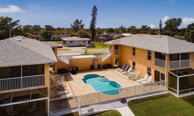 Pelican Apartment | Beautiful complex on Lake Louise private pool and pier