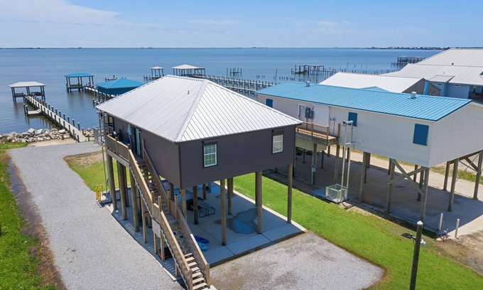 Lake Catherine House | Beautiful Lake House w/Private Pier & Dock, Kayaks, Fishing + Crabbing Gear