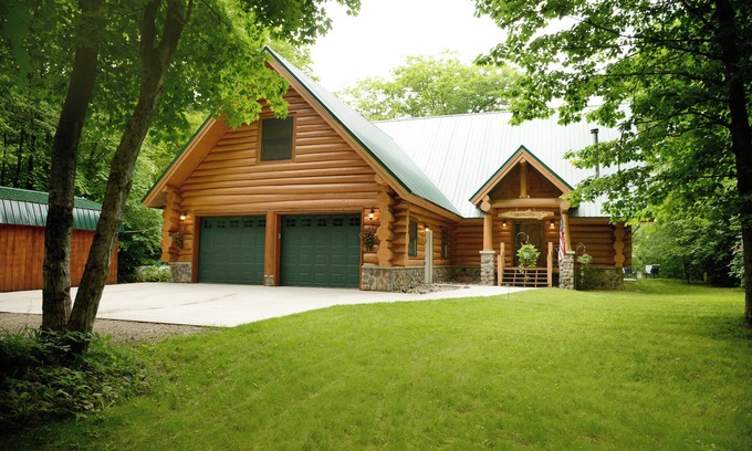 Brimley Cabin | Beautiful log cabin in the woods with a hot tub. 5 min walk to a quiet beach.