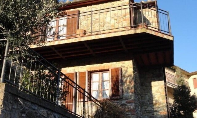 Caldana House | Beautiful stone house in Tuscany with terrace and balcony.